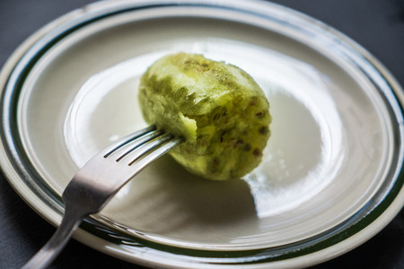prickly pear without the peel on a fruit plateの写真素材