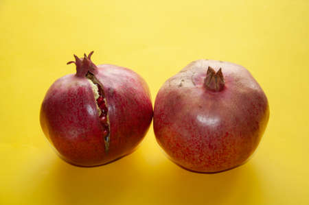 Red ripe pomegranate fruits. Natural pomegranate closeupの写真素材