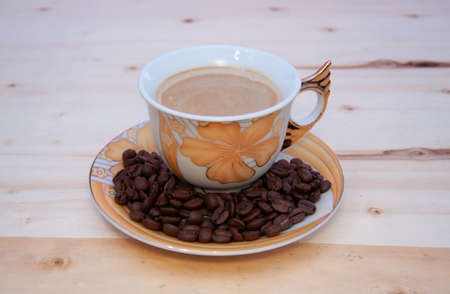 Dark roast coffee beans background, top viewの写真素材