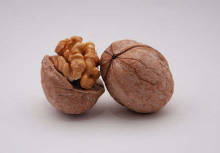 Delicious whole walnuts, isolated on white backgroundの写真素材