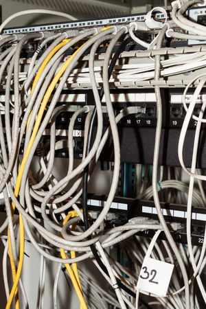 Volumes various network cables inside the rack
