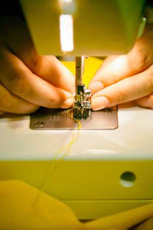 Sewing on the machineの写真素材