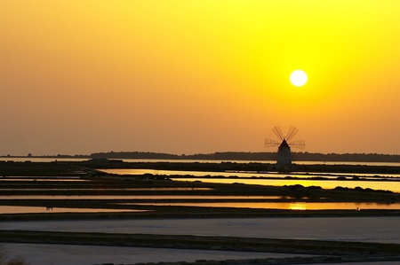 Windmill at saline, Marsala, southwest Sicily, Italyの写真素材