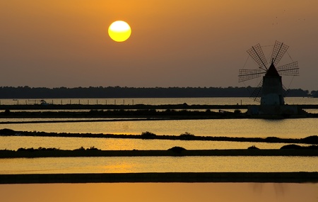 Windmill at saline, Marsala, southwest Sicily, Italyの写真素材