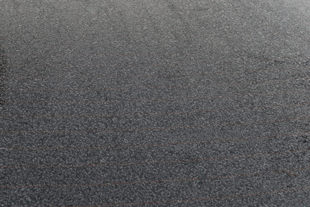 Frozen car glass close up. Differ large snowflakes. Hoarfrost on the machine.の写真素材