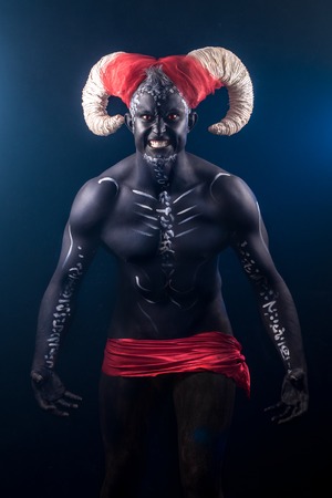 Fiery demon. A terrible demon with hornsの写真素材