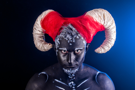 Fiery demon. A burning demon with hornsの写真素材