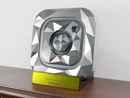 Diamond Instagram Award like Diamond play button with wood holder and gold nameplate in side viewのeditorial素材