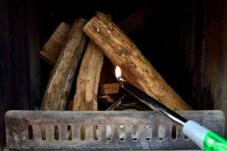 Turning on the fire in the furnace: the lighterの写真素材