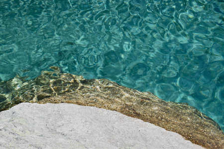 Water and rocks on the alpsの写真素材