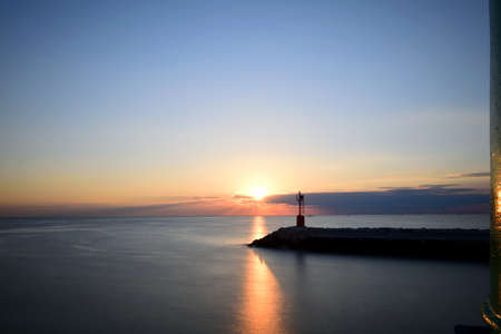 Tranquility at the sunrise in the harborの写真素材