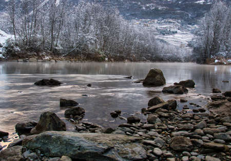 Picture of Adda river with the town of Montagna in Valtellina in backgroundの写真素材