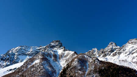 Picture of the peaks called Monte Braccia from PalÃ¹, in winter.の写真素材