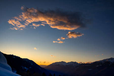 Valtellina valley at the sunset with Monte Spluga and Cima del Desenigo in backgroundの写真素材