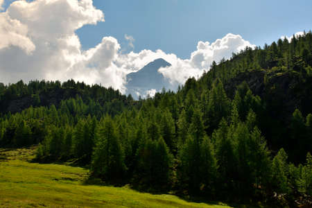 The majesty of one of the most famous mountain in the central Alps within the cloudsの写真素材