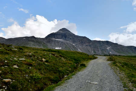 A path leading to Pizzo Scalino mountainの写真素材