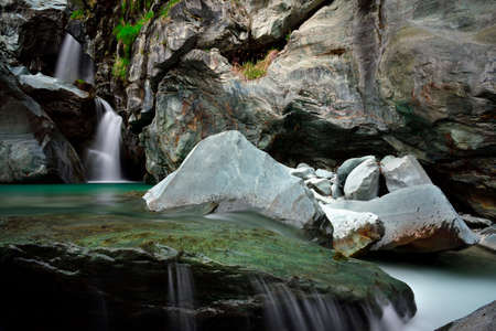 The green water between the waterfalls of Lanterna creekの写真素材