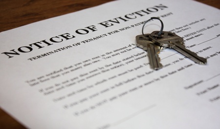 Letter stating Notice of Eviction with house keysの写真素材