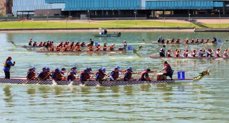 TEMPE AZ/USA - MARCH 28: Unnamed people in a crowd gather to watch the Dragon Boat Festival on Tempe Town Lake Tempe Arizona on March 28 2015のeditorial素材