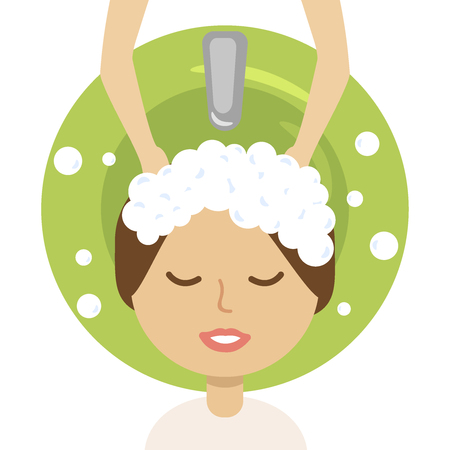 Young woman and hairdresser washing her head at hair salon.のイラスト素材