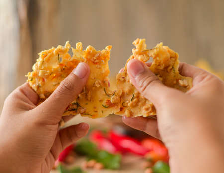 Peyek kacang or shrimp crackers are one of the traditional authentic food from Indonesia made from...