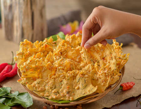 Peyek kacang or shrimp crackers are one of the traditional authentic food from Indonesia made from flour dough with peanut and baby shrimp.の写真素材