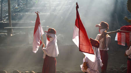 9 August 2020, Yogyakarta, Indonesia: indonesian student carnaval for Indonesia independence day, Garuda bird and flag propertiesのeditorial素材