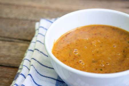 Peanuts sauce, made from peanuts, Indonesia traditional sauce for food like satay, pecel (Javanese Salad), lontong, and more indonesian traditional foodの写真素材