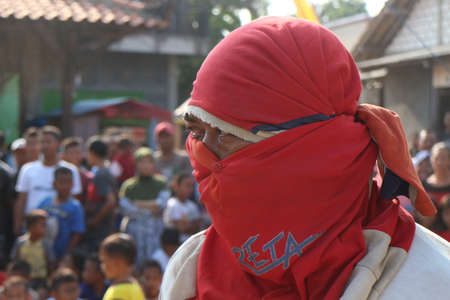Traditional game from Indonesia named Panjat Pinang. This game won prizes that were mounted on top...