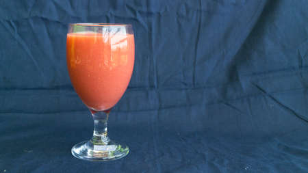 Guava juice with guava fruit with blue backgroundの写真素材