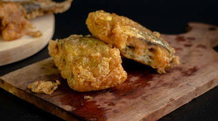 Bandeng Presto Goreng. Fried tendered-bone milkfish served with traditional side dishesの写真素材