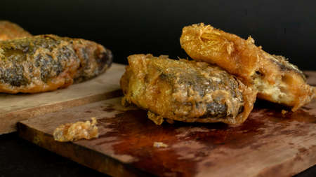 Bandeng Presto Goreng. Fried tendered-bone milkfish served with traditional side dishes