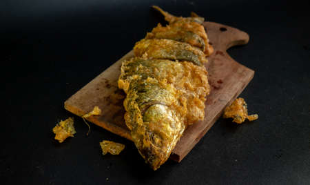 Bandeng Presto Goreng. Fried tendered-bone milkfish served with traditional side dishesの写真素材