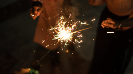 Blurry of children having fun playing fireworks