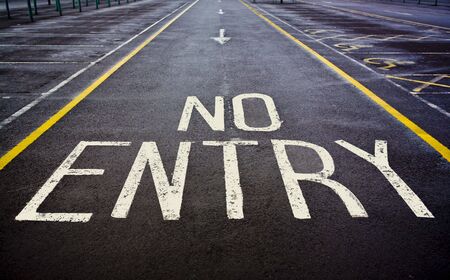 No entry sign painted on roadの写真素材