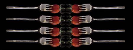 Tomatoes on Forksの写真素材