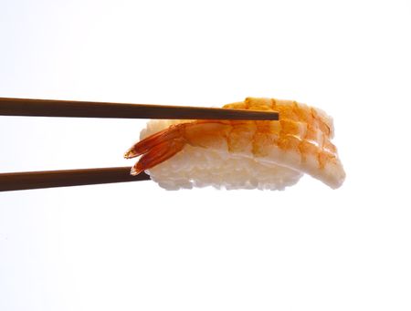 Sushi with chopsticksの写真素材