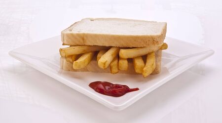 Chip Sandwich on White Bread with Tomato Ketchup の写真素材