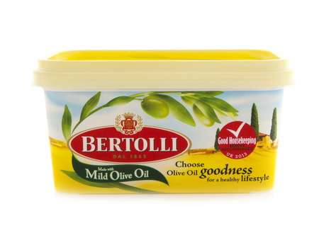 SWINDON, UK - FEBRUARY 1, 2014:  Tub of Bertolli Vegtable Spread with oOlive Oil on a white backgroundのeditorial素材