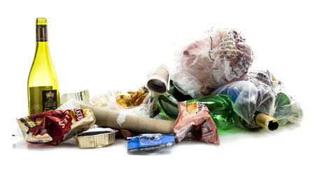 SWINDON, UK - FEBRUARY 18, 2014: Pile of rubish showing well know brand names on a white backgroundのeditorial素材