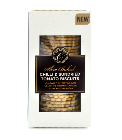 SWINDON, UK - MARCH 8, 2014:  Marks And Spencer Slow Backed Chilli & Sundried Tomato Biscuits on a white backgroundのeditorial素材