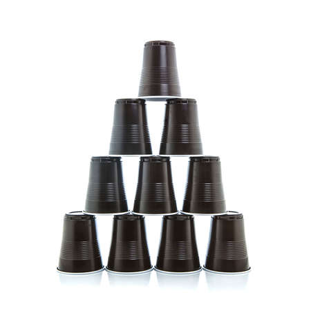 Pyramid of plastic cups isolated on white background のeditorial素材