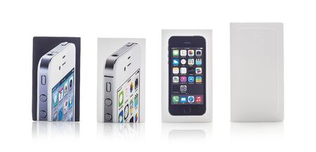 SWINDON, UK - NOVEMBER 15, 2014: Colection of used Apple iPhone boxes on a white background showing the growth of the iPhone family from the iPhone 4 though to the new iPhone 6Sのeditorial素材