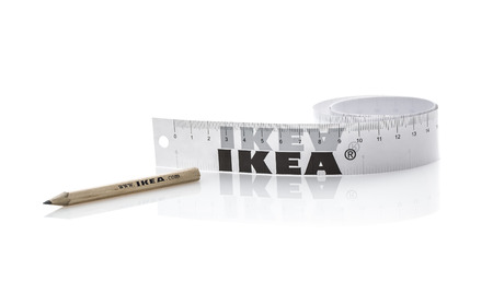 BRISTOL, UK - NOVEMBER 16, 2014: Ikea Pencil and Teap Measure on a White Background, Founded in Sweden in 1943, Ikea is the world's largest furniture retailer.のeditorial素材