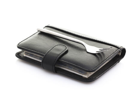 Fork on Filofax but no time for lunch, Business lunch Concept on a White Background with copy Space