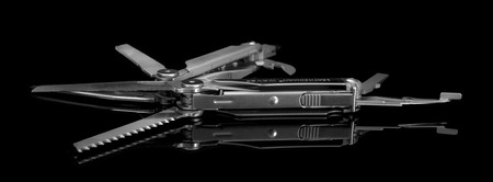 SWINDON, UK - DECEMBER 30, 2016: Leatherman Wave multitool on a black backgroundのeditorial素材