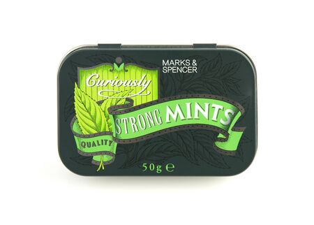 SWINDON, UK - JANUARY 1, 2017: Tin of curiously strong mints from Marks and Spencerのeditorial素材