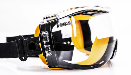 SWINDON, UK - AUGUST 18, 2018: Pair of DeWalt Safety Glasses on a White Backgroundのeditorial素材