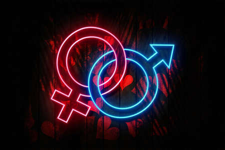 Venus and Mars Pink and Blue Gender symbol Neon Sign on a Dark Heart decorated Wooden Wall  3D illustration.の写真素材