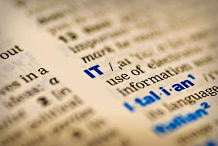 Closeup of the word IT in a dictionaryの写真素材